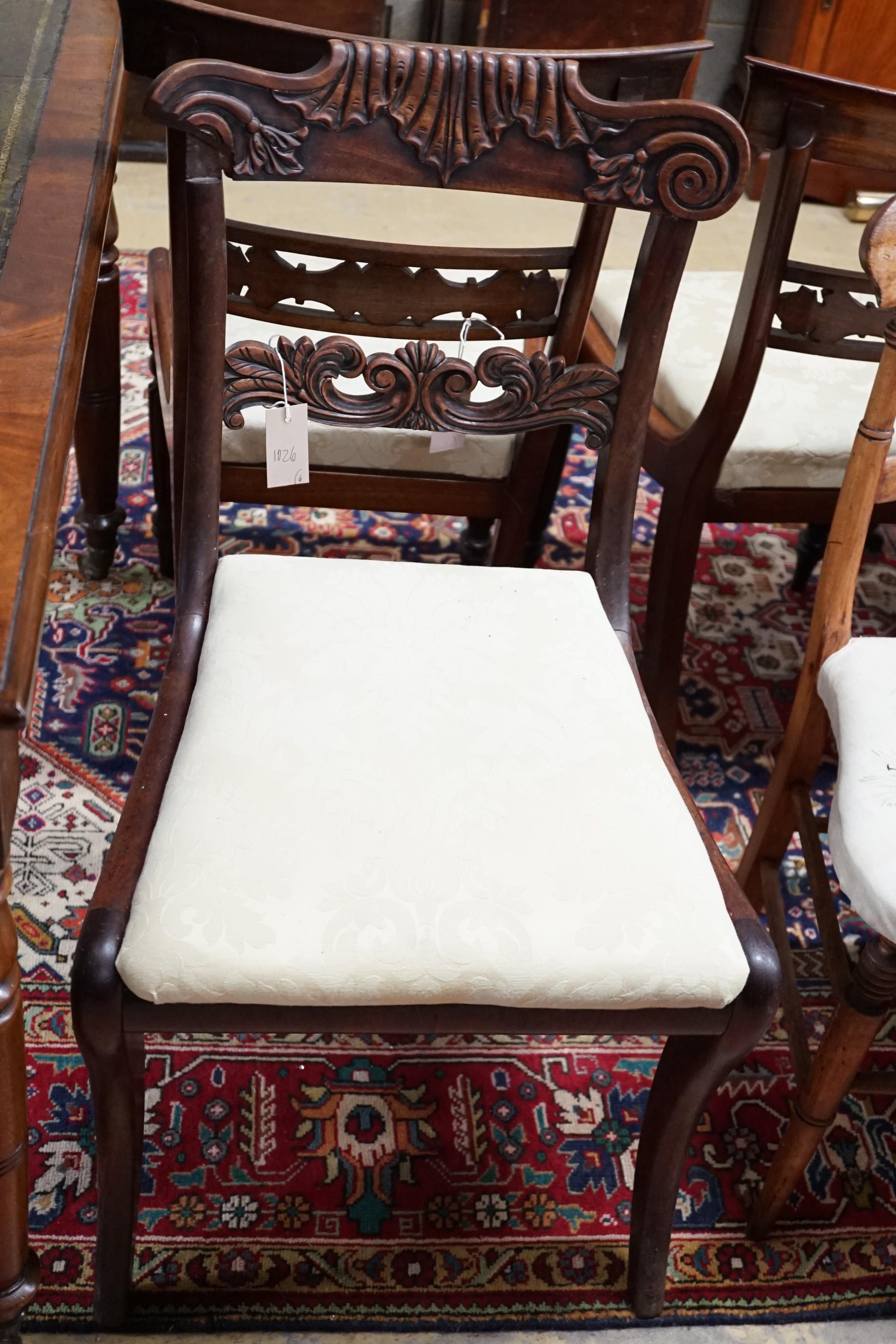 Two pairs of William IV mahogany dining chairs, a Victorian mahogany armchair and a bedroom chair